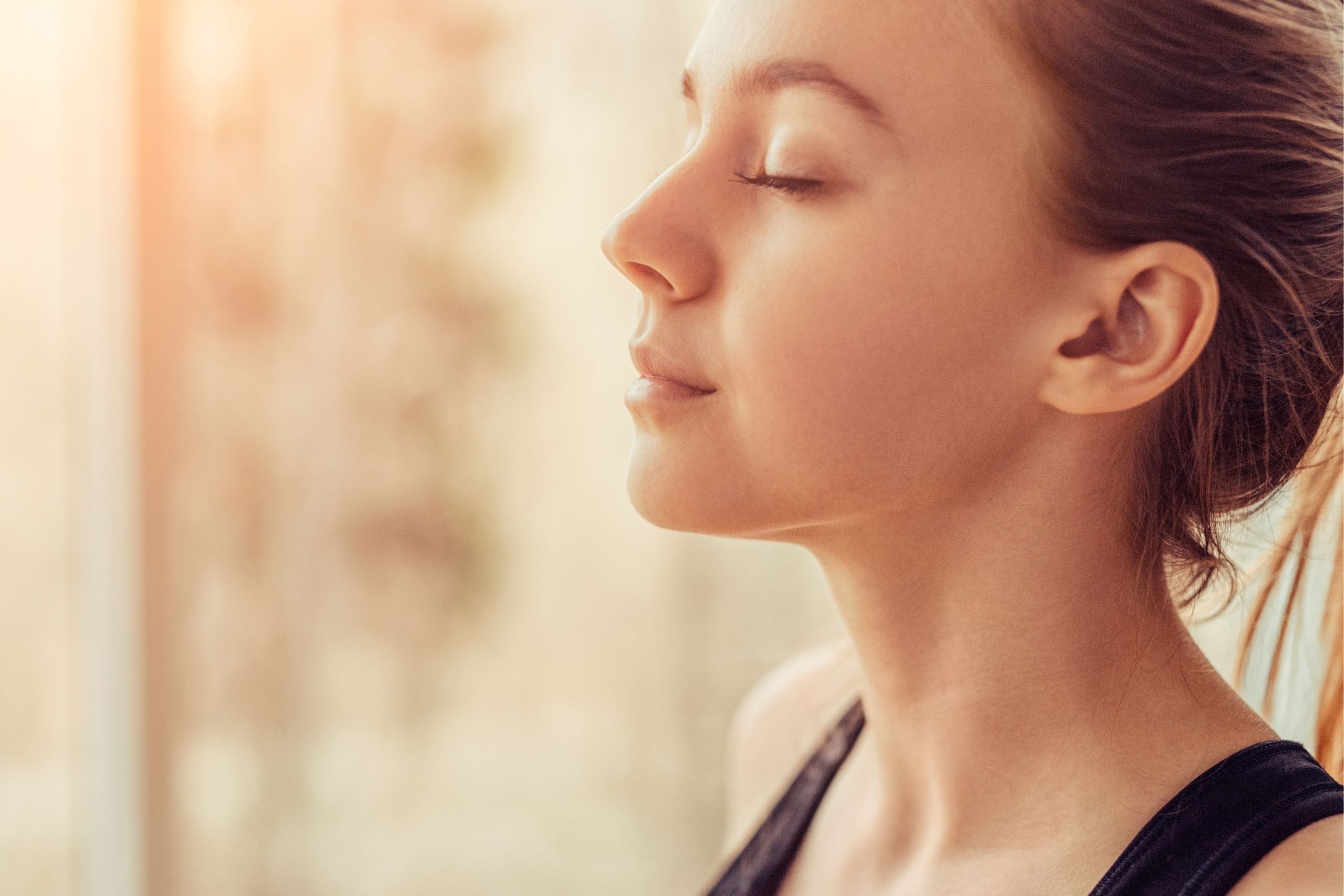 Woman taking a deep breath