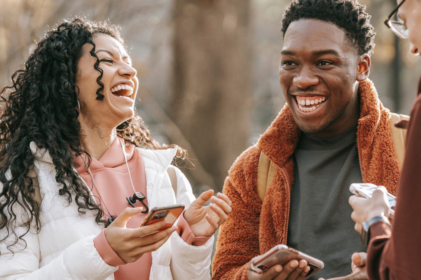 Three people laughing