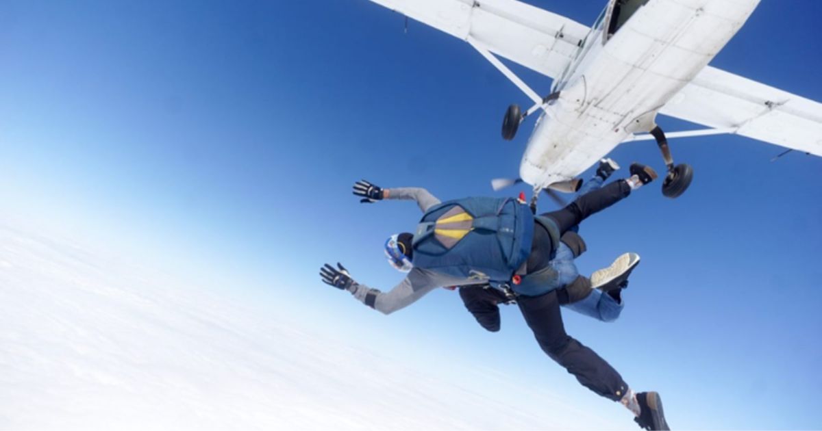 Man jumping out of plane for CPSL Mind