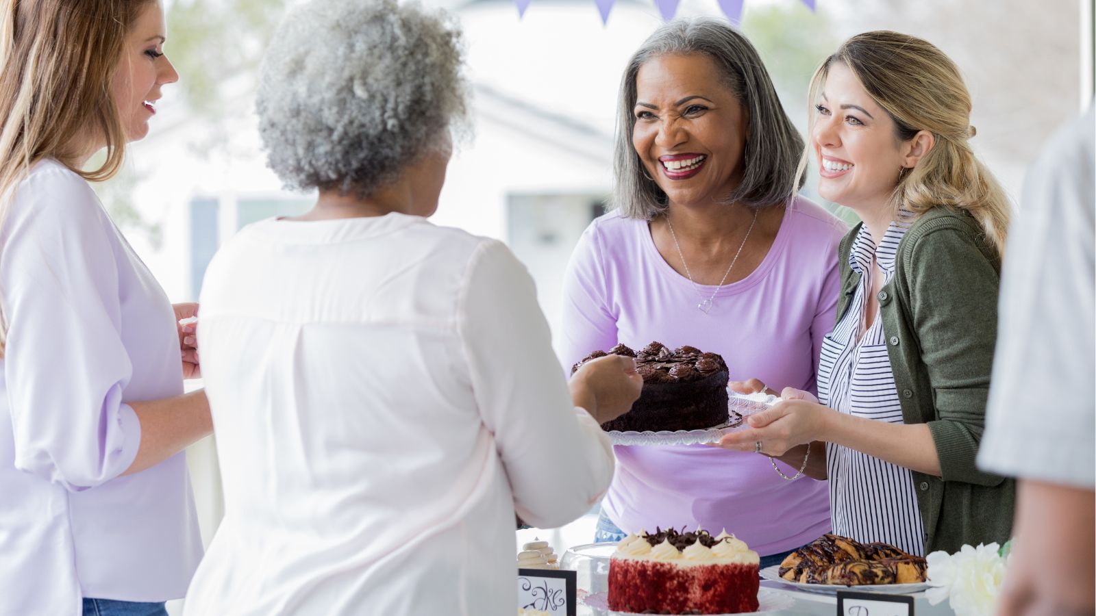 Group of friends with a cake