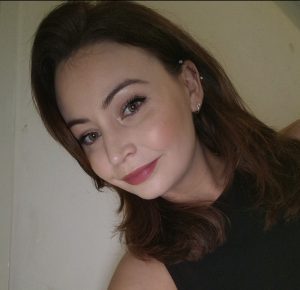 Headshot of woman with brown hair