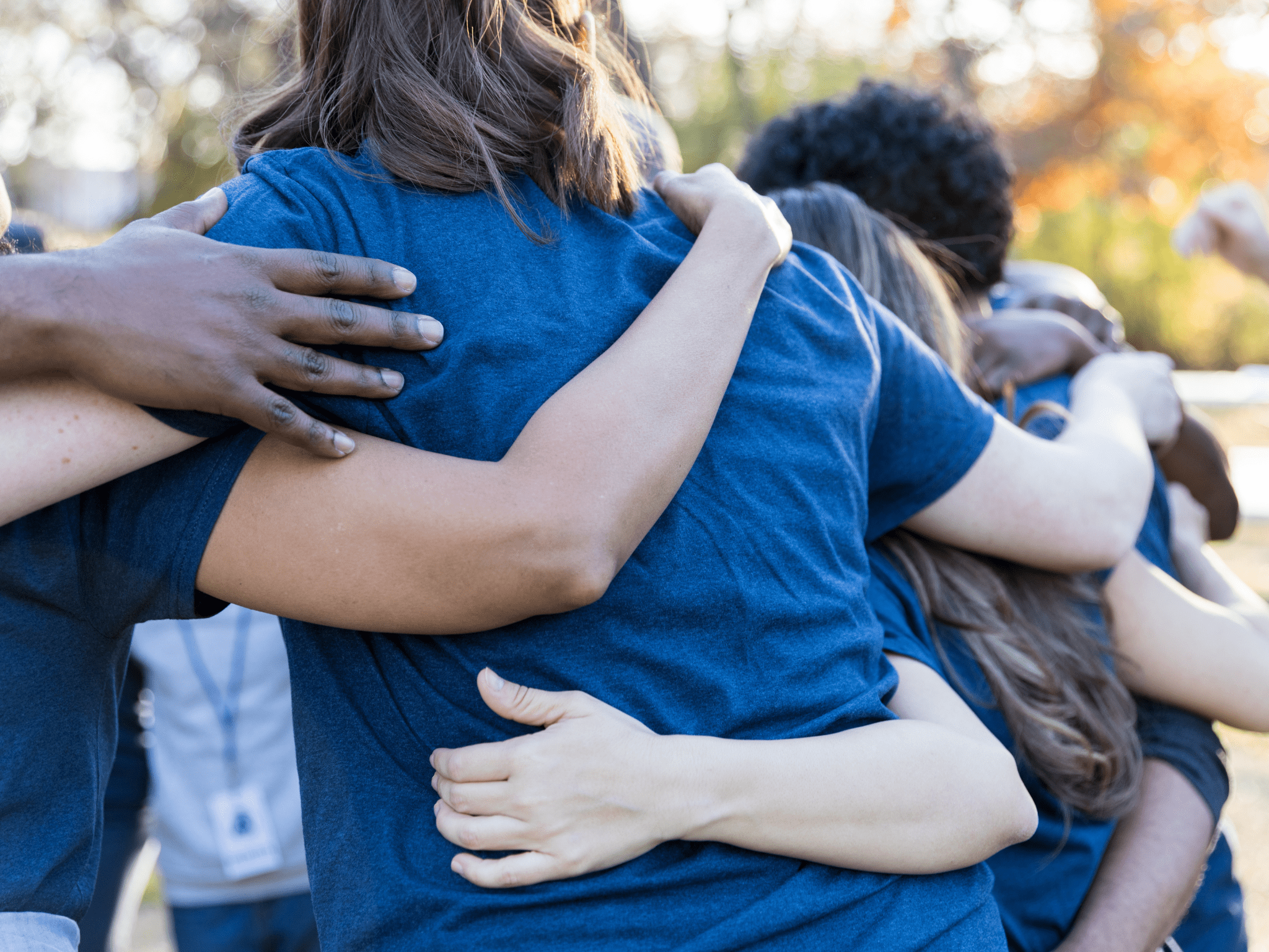 A group of people working together to help their community.