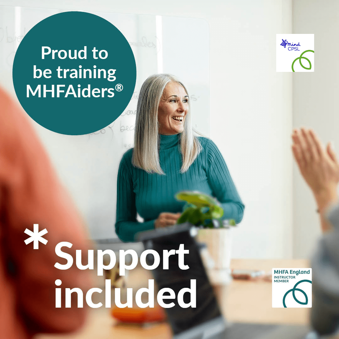 lady with grey hair wearing green jumper