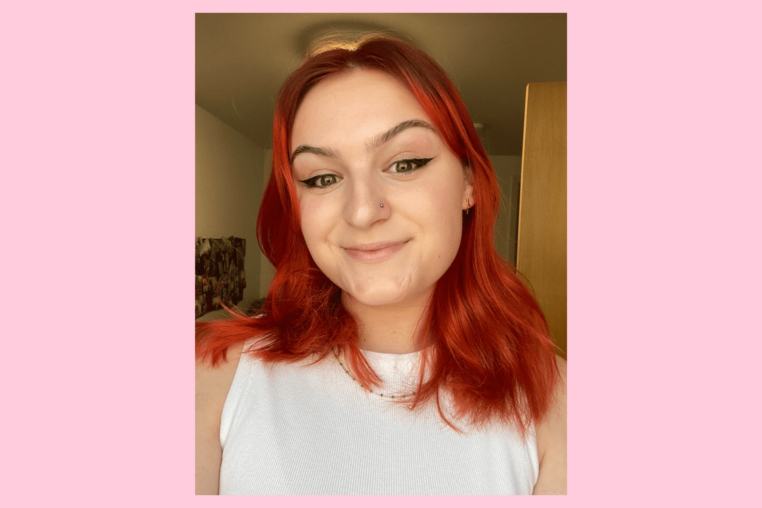 Girl with red hair wearing a white t-shirt