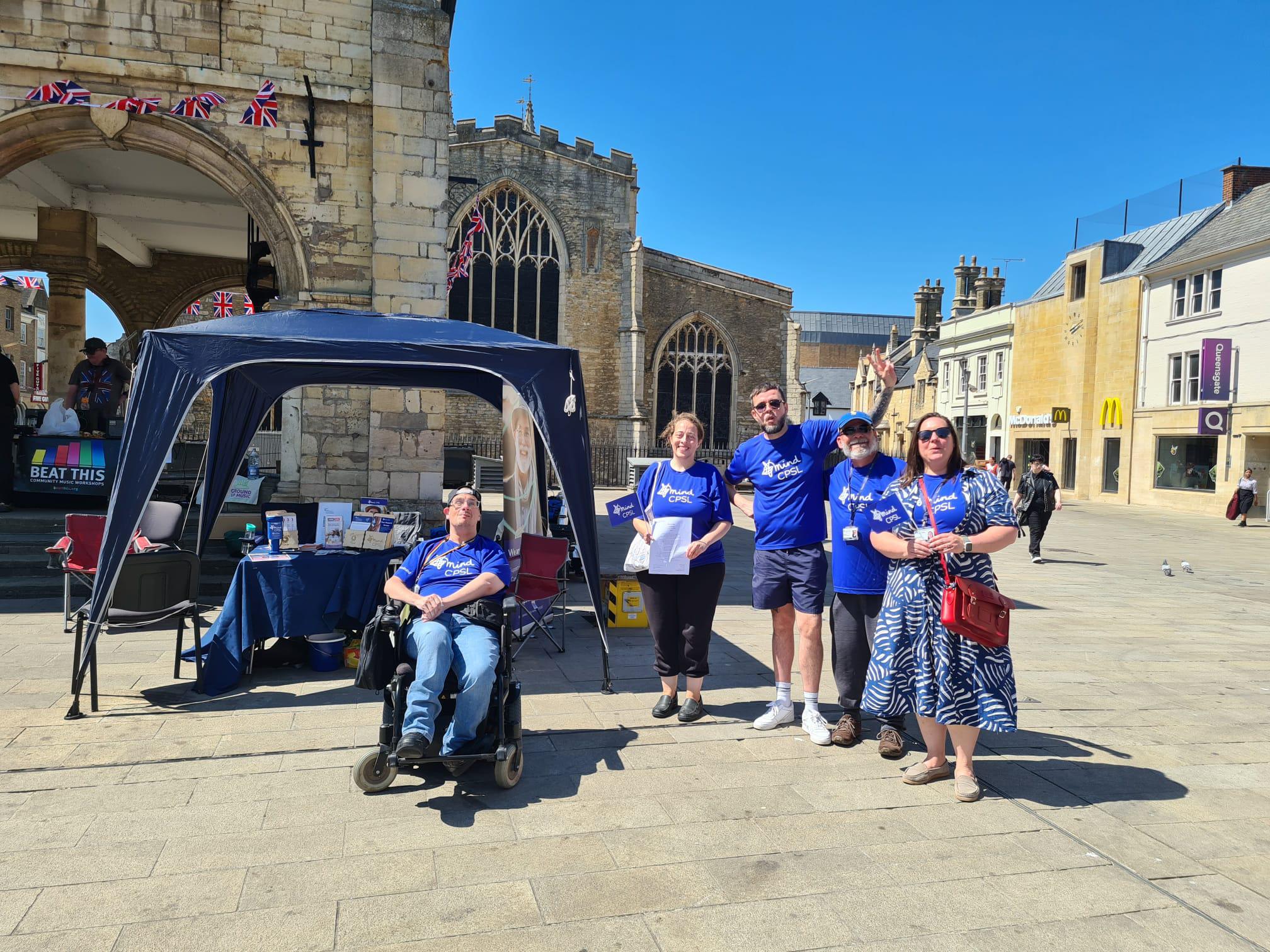 people standing in Peterborough Cathedral square