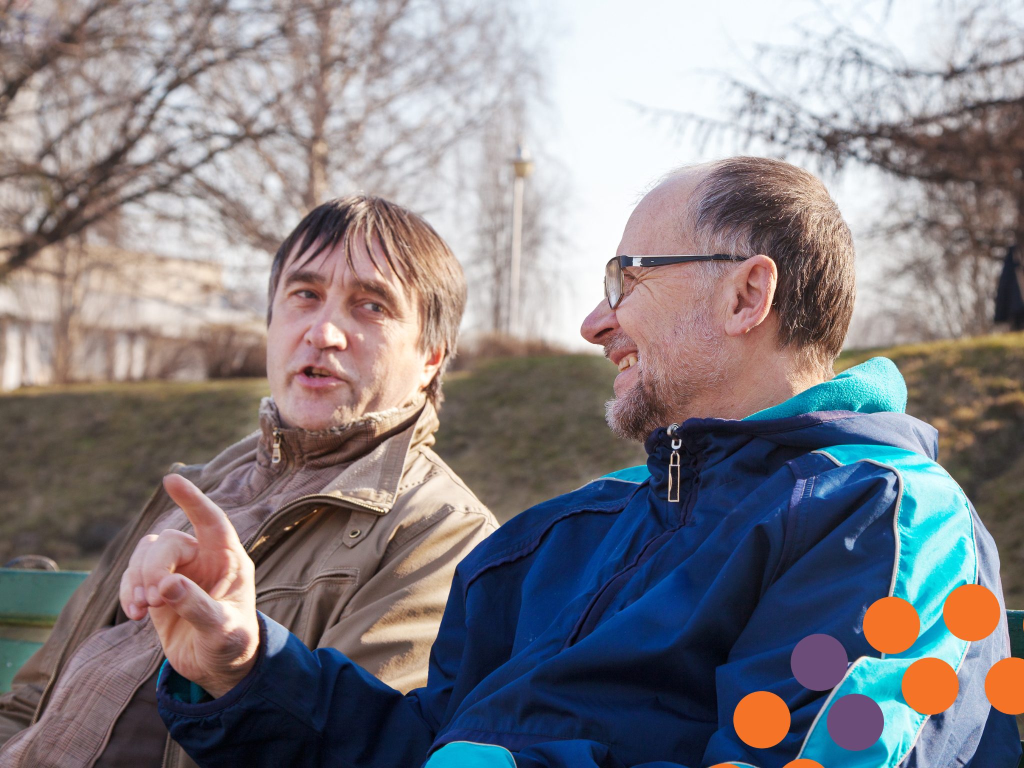 STOP Suicide - Men's Health Campaign 2 men sitting on park bench outside