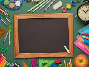 school blackboard and crayons